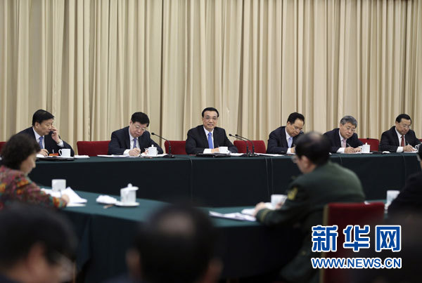 中共中央政治局常委、国务院总理李克强参加十二届全国人大三次会议山东代表团的审议。 新华社记者丁林摄 中共中央政治局常委、国务院总理李克强参加十二届全国人大三次会议山东代表团的审议。 新华社记者丁林摄